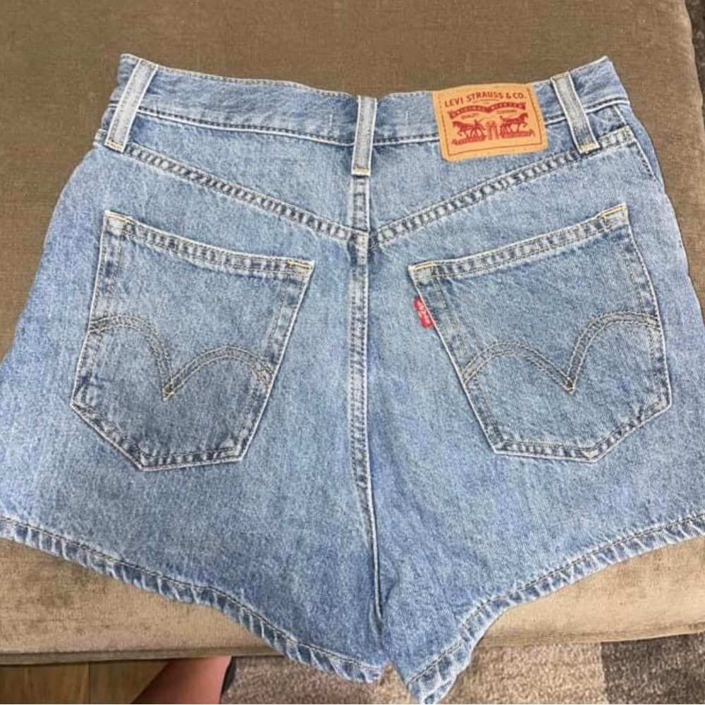 Levi high waisted shorts, new without tags. Never wore size 25